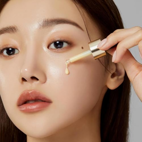 Medicube Deep Vita C Serum droplets on hand for quick absorption
