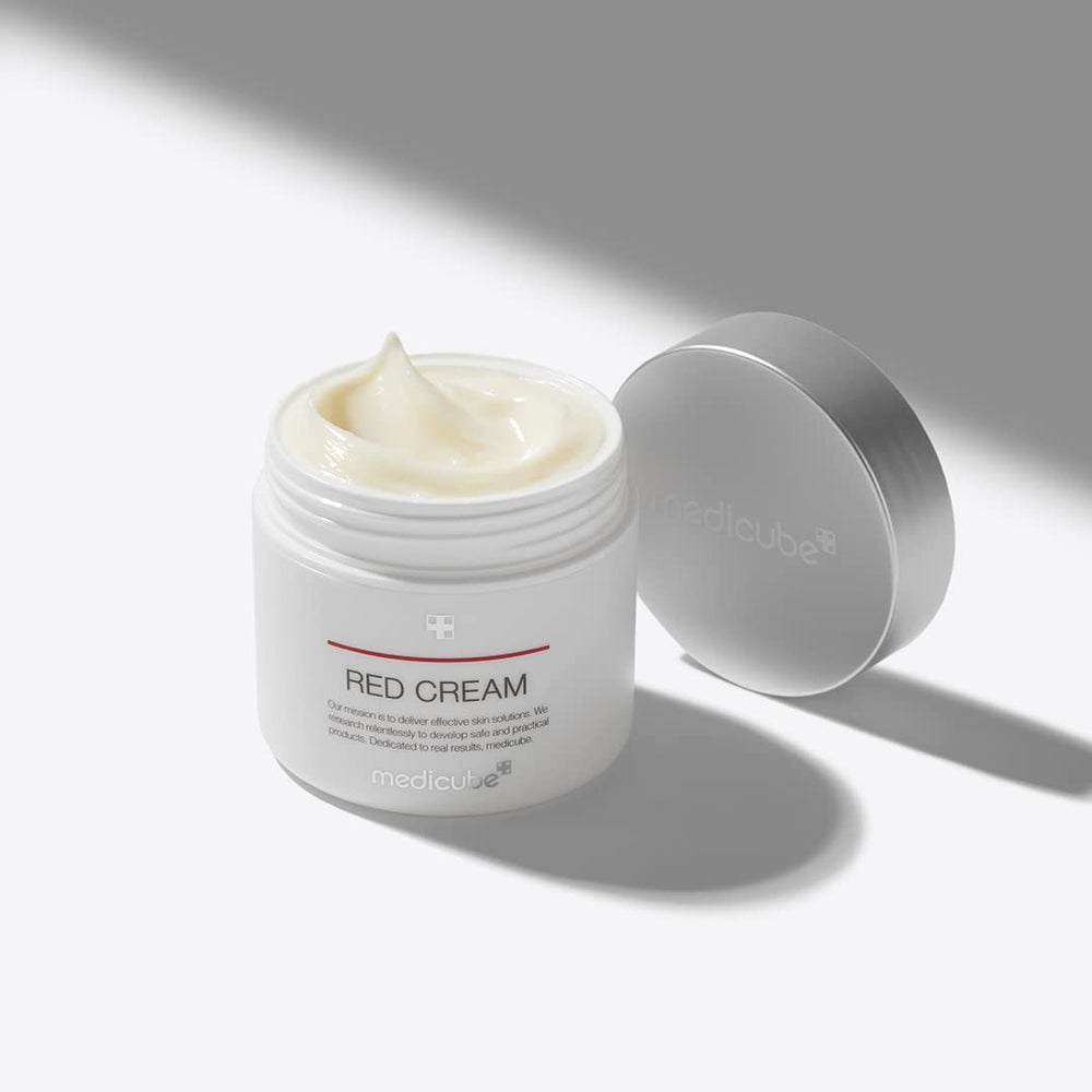 Medicube Red Cream 2.0 tube closeup shows smooth texture for everyday relief.