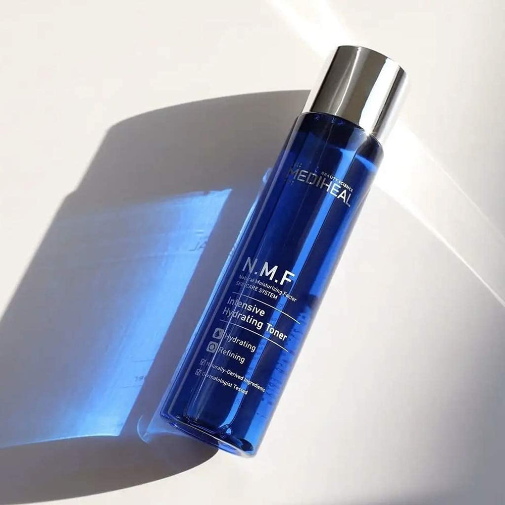 Mediheal N.M.F Intensive Hydrating Toner pour demonstrates refreshing application for supple skin