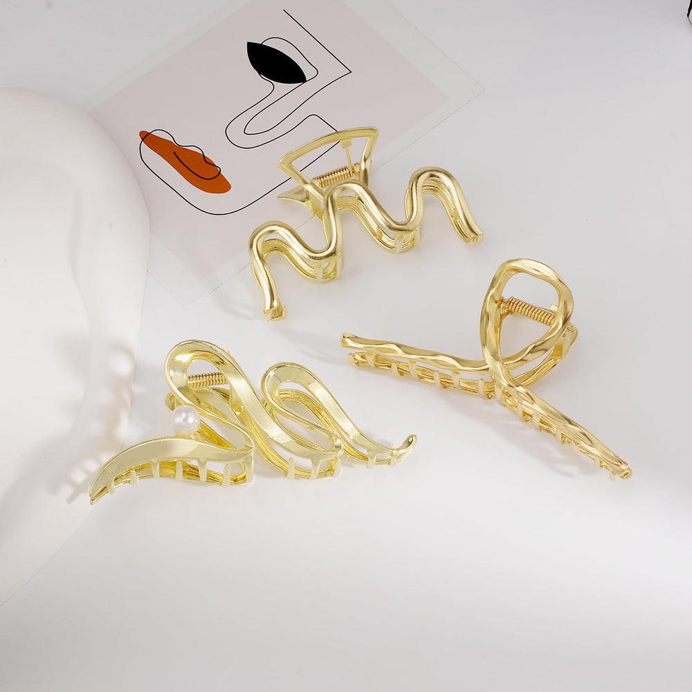 Mehayi hair claws complement outfits with shiny decorative accents.