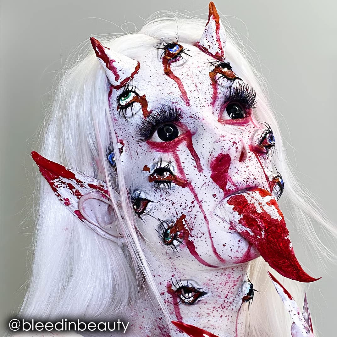 Mehron Paradise AQ white face and body art in progress for cosplay.