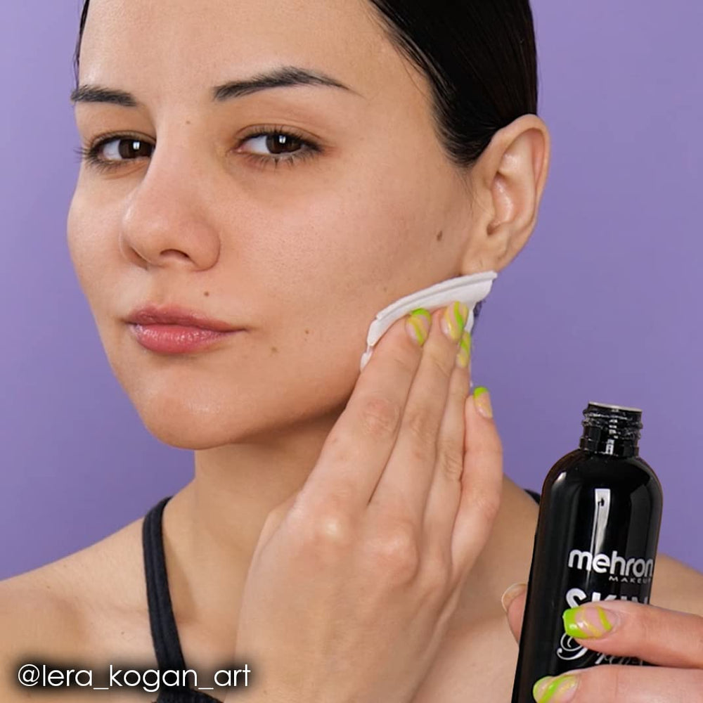 Model with Mehron Skin Prep Pro achieving matte finish under hot stage lighting.