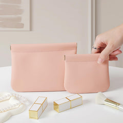 MEIBOOCH organosilicon leather mini bag in pink provides durable waterproof protection for cosmetics.