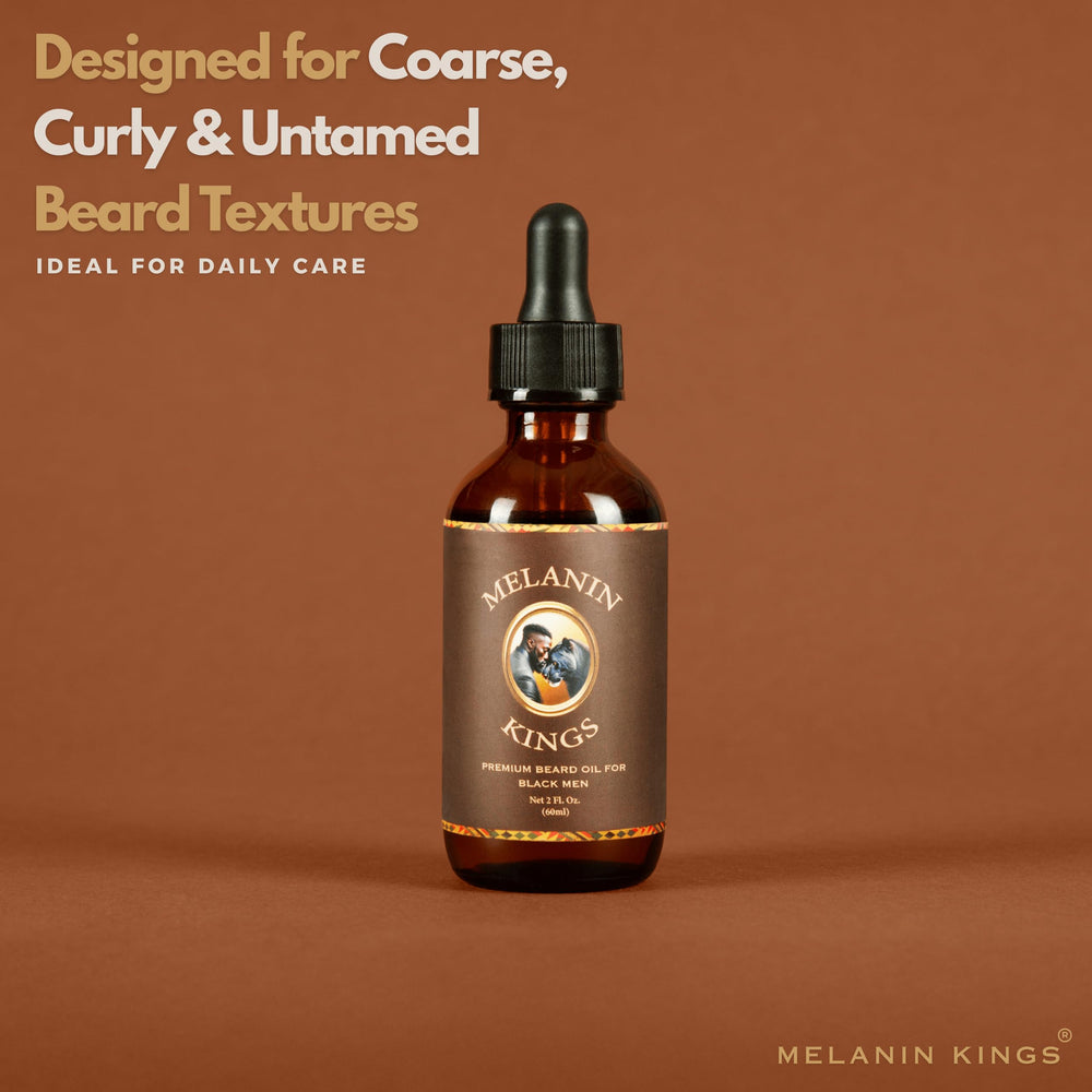 Hand massaging Melanin Kings beard oil into beard to reduce frizz.