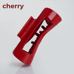 MELLO squishy red clip close-up emphasizes secure hold and easy removal after long wear.