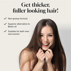 Meraz Pureauty Naturals Biotin Hair Growth Serum applies to scalp for daily care.