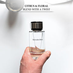 Mercedes-Benz Cologne for Men liquid in glass shows a bright citrus opening and smooth dry-down.