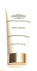 Merle Norman Miracol Creamy Formula Mask drying shows rich cream texture for exfoliation and pore refining