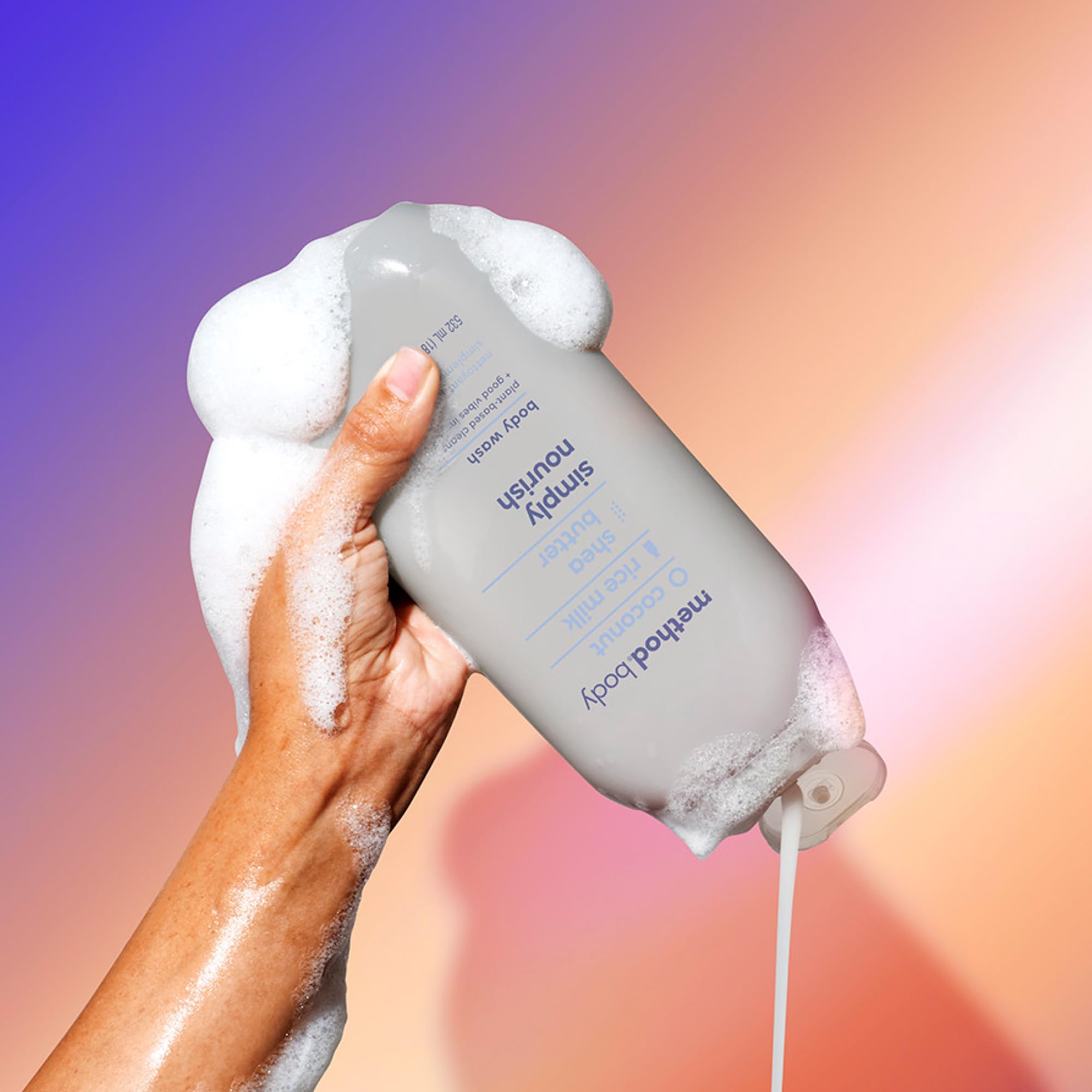 Method Simply Nourish bottle close-up shows shea butter for lasting moisturization.