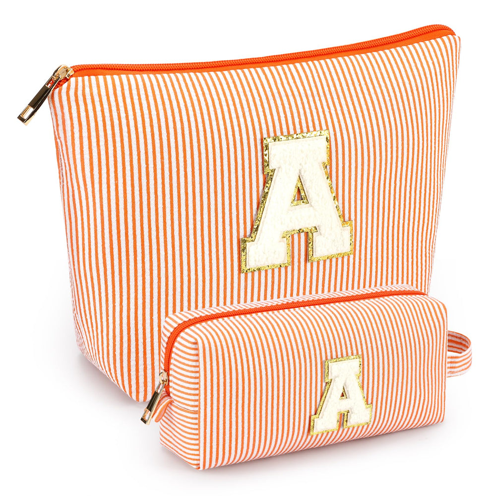 Mibasies initial makeup bags orange A front view for portable cosmetics organization.