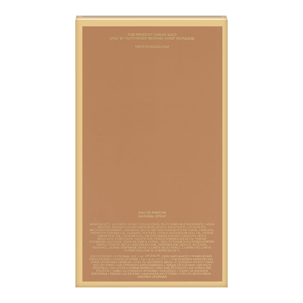 Michael Kors Pour Femme product shot on display emphasizes luxurious packaging and versatile evening wear.