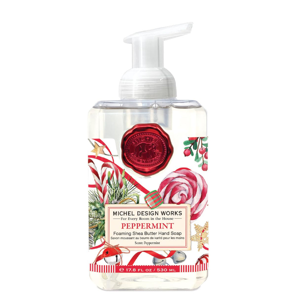 Michel Design Works Peppermint foaming hand soap pump on bathroom shelf for refreshing cleanse.