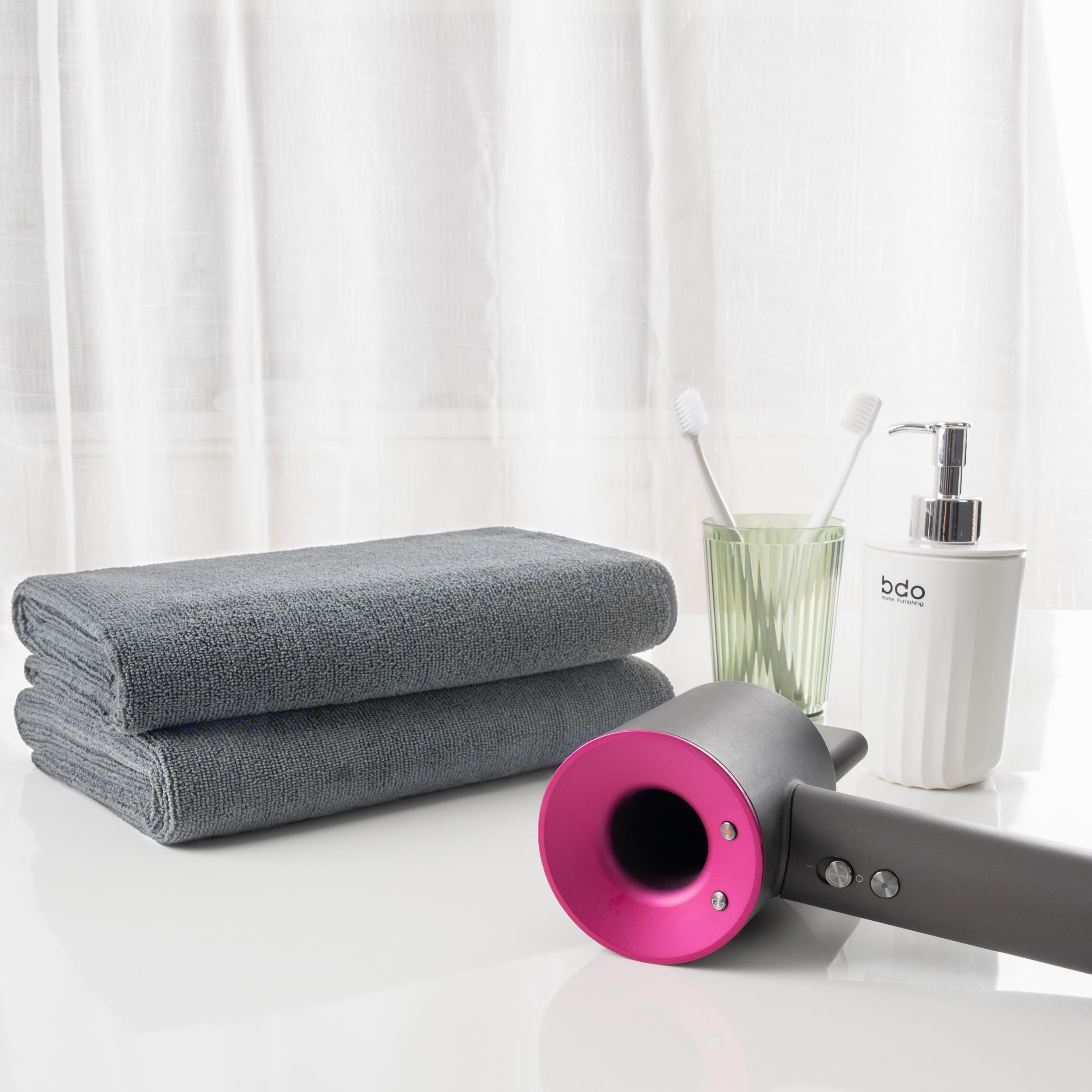 Microfi microfiber hair-drying towels gray pack folded on towel rack.