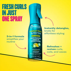 Mielle Kalahari Melon & Aloe Leave-In Detangler nozzle in use for detangling.