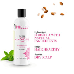 Mielle Organics Mint Almond Oil on-hair use shot emphasizes smooth, manageable strands with lightweight conditioning