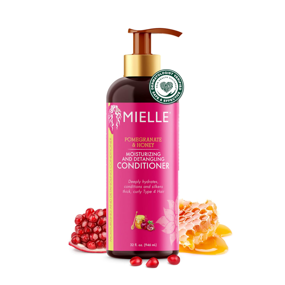 Mielle Organics Pomegranate & Honey detangling conditioner bottle close-up for smooth curls