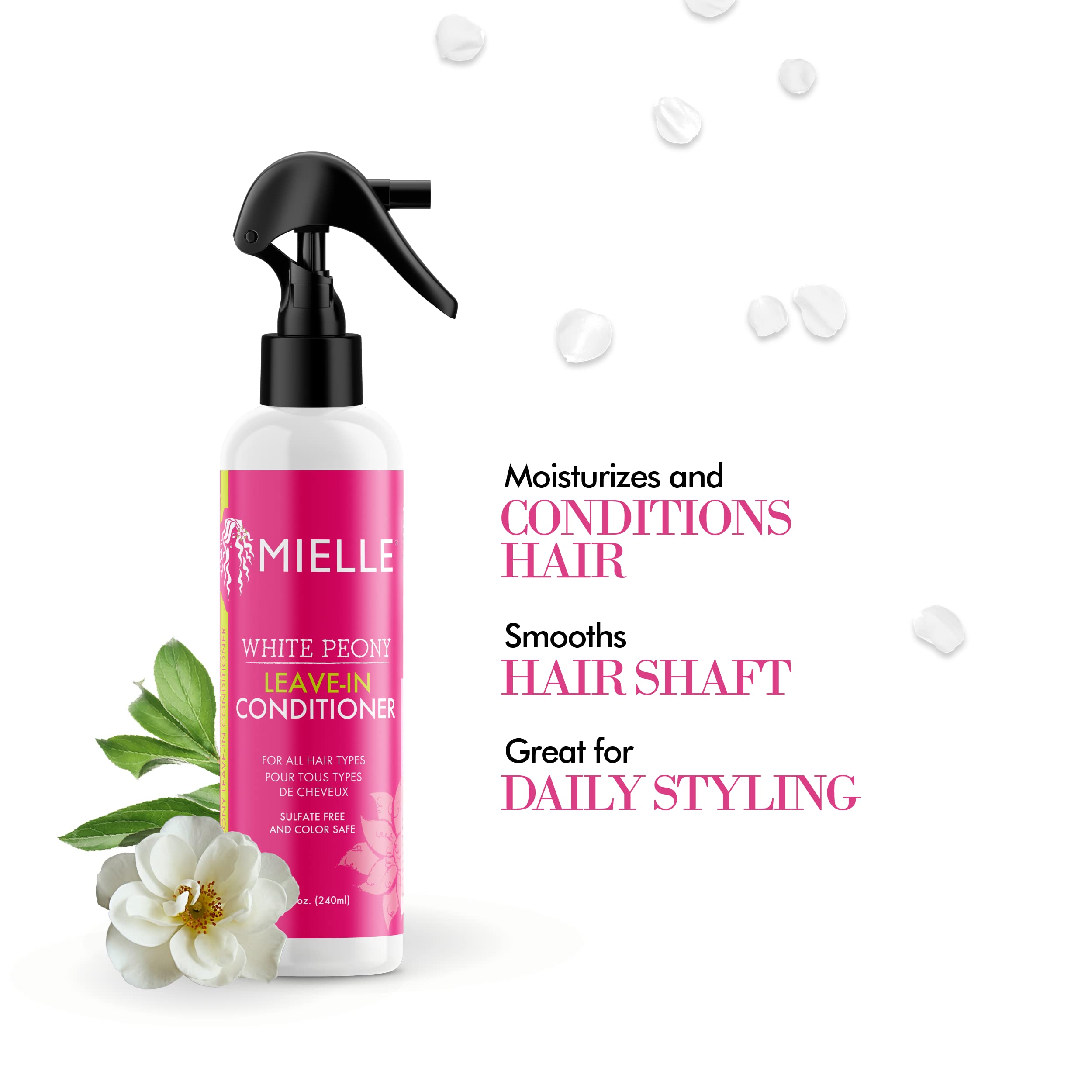 Mielle Organics White Peony Leave-In being applied to damp hair for smooth strands.