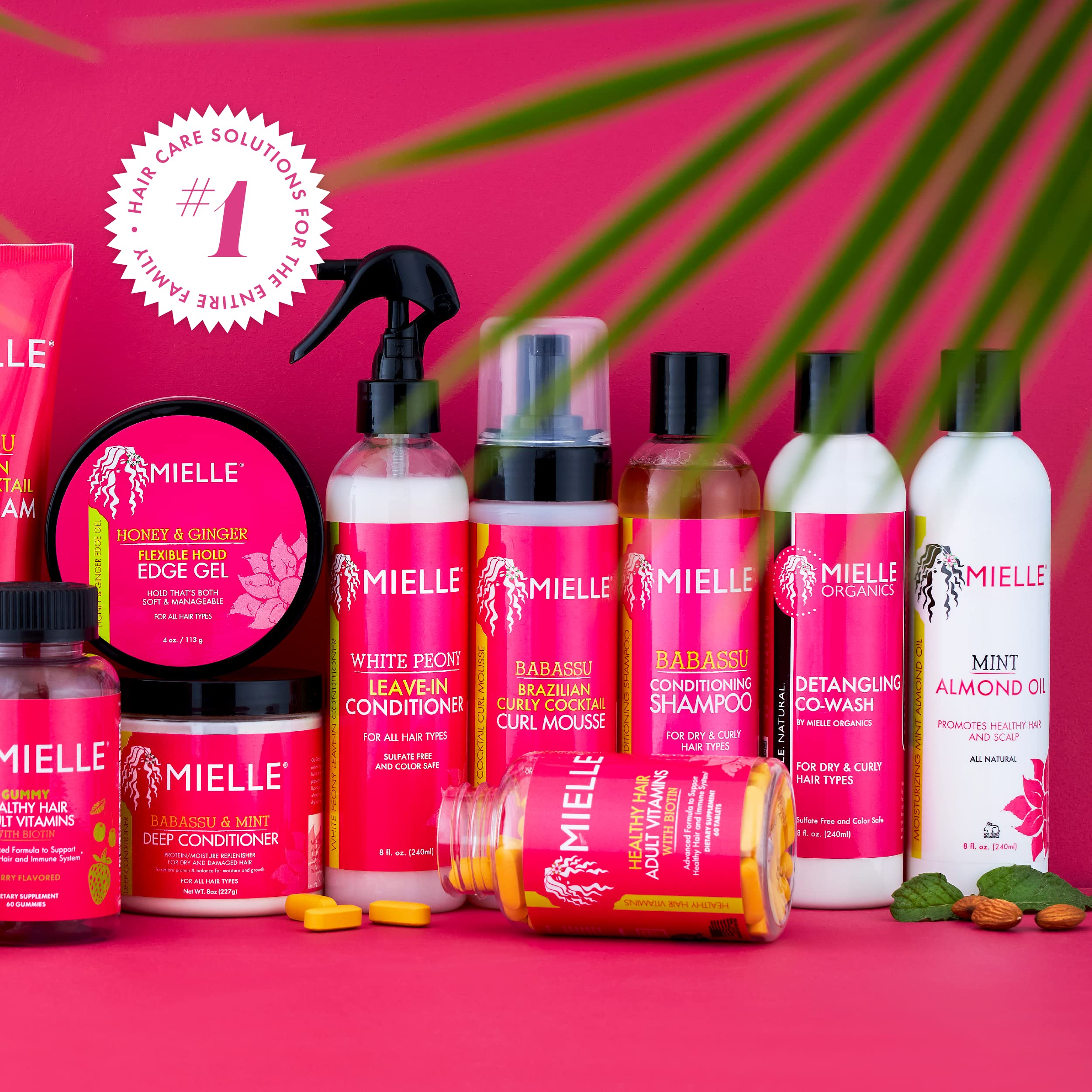 Mielle Organics White Peony Leave-In on hair showing reduced frizz and shine.