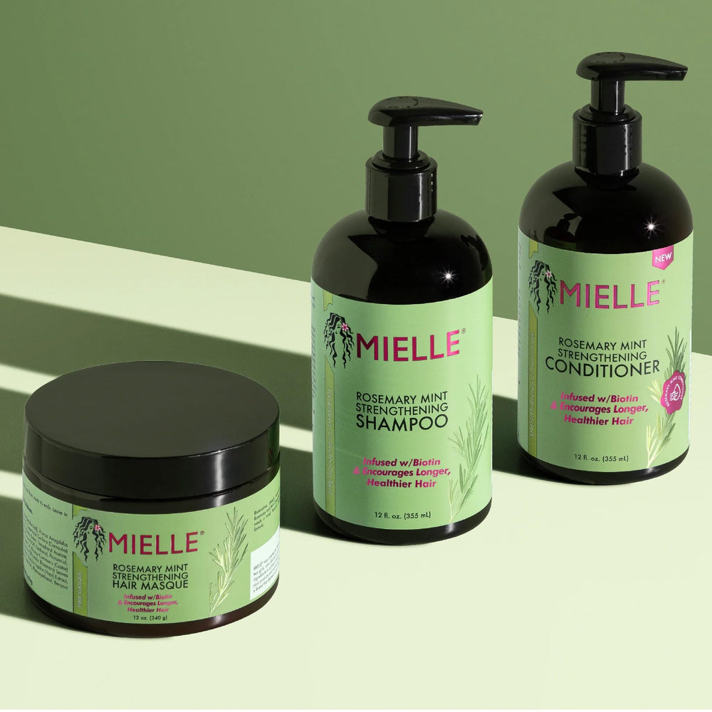 Mielle Rosemary Mint Shampoo bottle with refreshing rosemary-mint aroma.