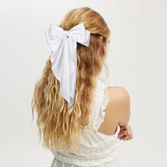 MIKONIKO butterfly-pattern satin bow enhances festive outfits