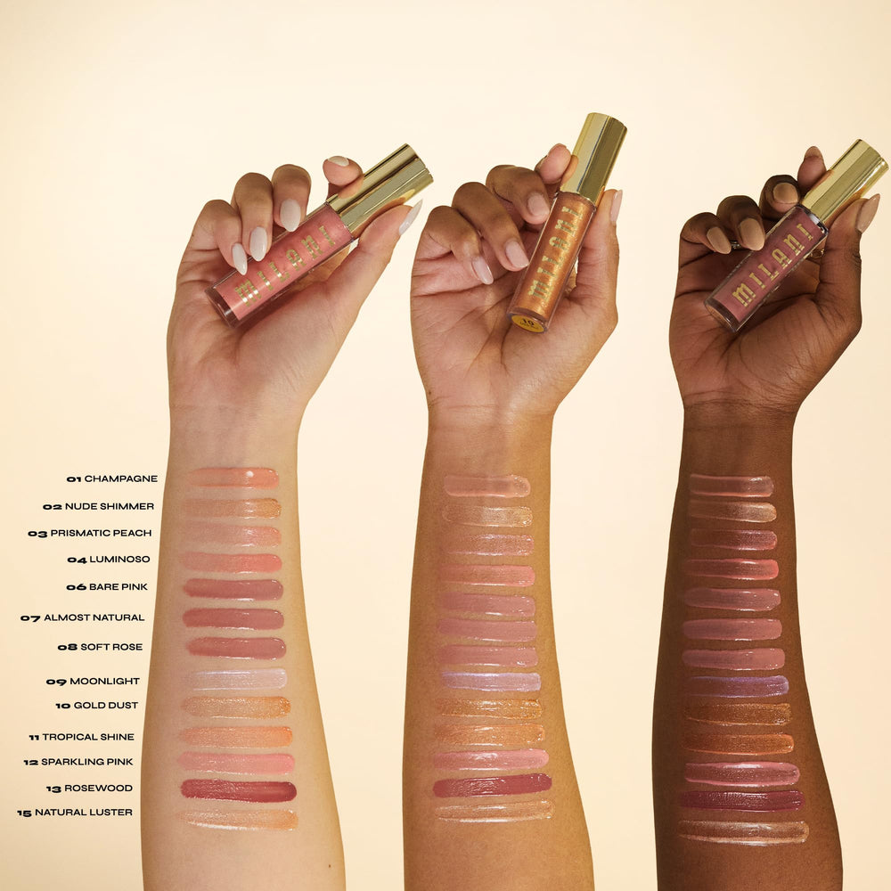 Milani Keep It Full Champagne close-up lip gloss swatch on lips.