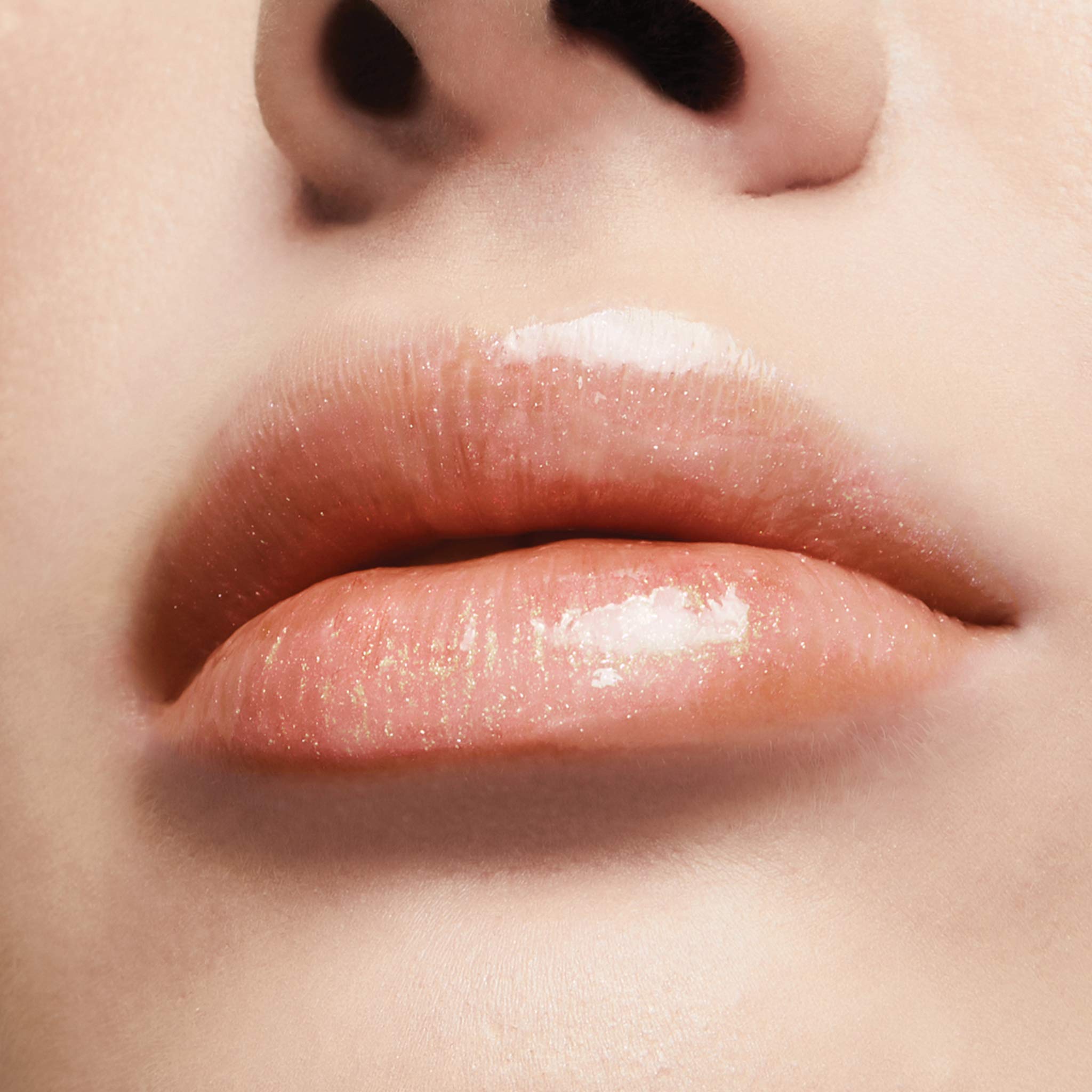 Milani Lip Gloss Keep It Full packaging tube for on-the-go touchups.