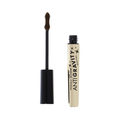 Milani Mascara bottle close-up highlights brown-black shade and long-lasting wear.