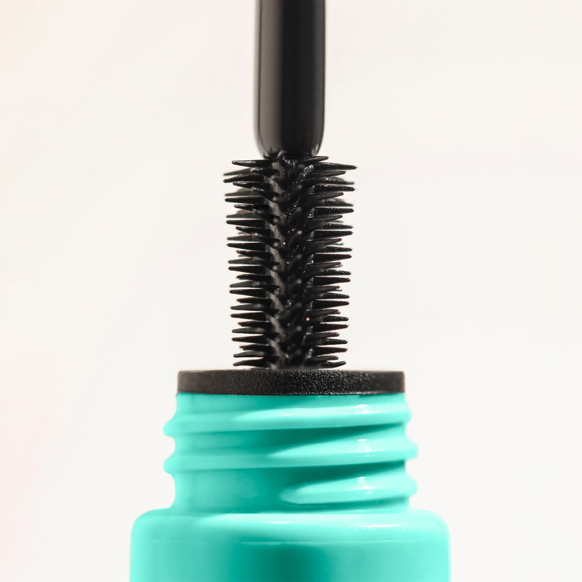 Milani tubing mascara lashes length appearance shows instant extended lashes.