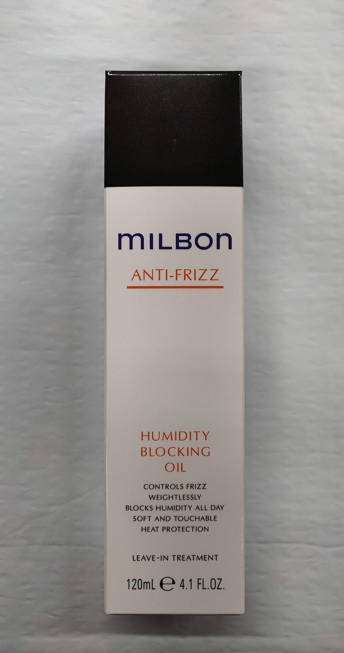 Milbon Anti-Frizz Humidity Blocking Oil bottle - lightweight protection for smooth, touchable waves and frizz defense.