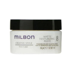 Milbon Matte Texturizing Paste jar close-up highlights matte texture.