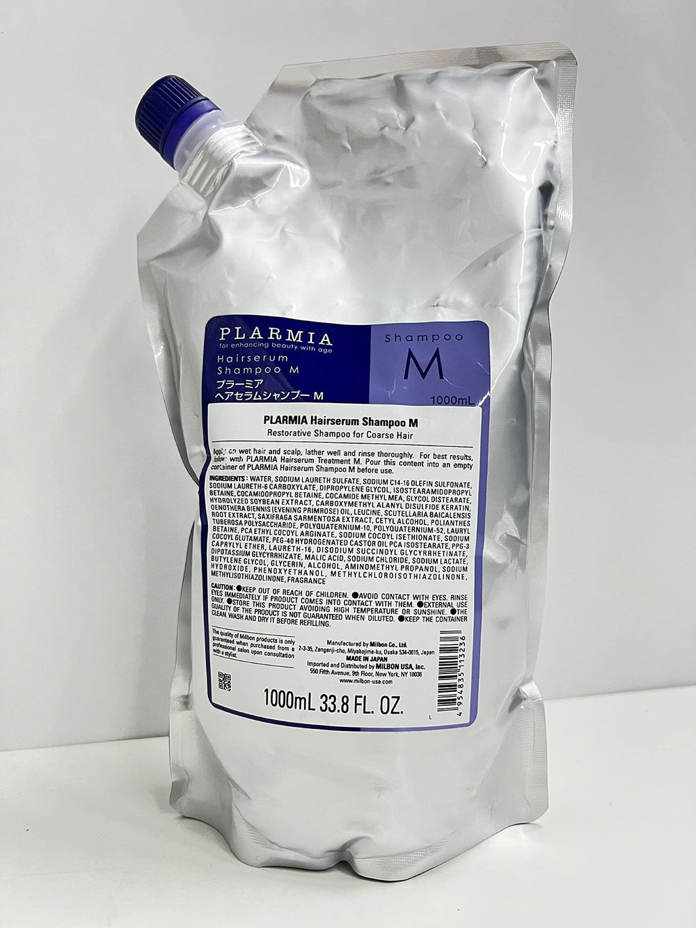 Milbon Plarmia Hairserum M Shampoo pour closeup highlights rich lather and easy dispensing.