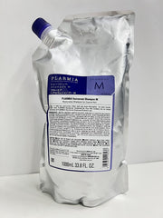 Milbon Plarmia Hairserum M Shampoo pour closeup highlights rich lather and easy dispensing.
