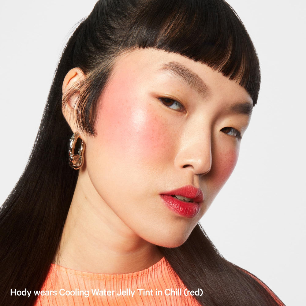 Milk Makeup Balmade Lip Balm being applied for hydration and gloss.