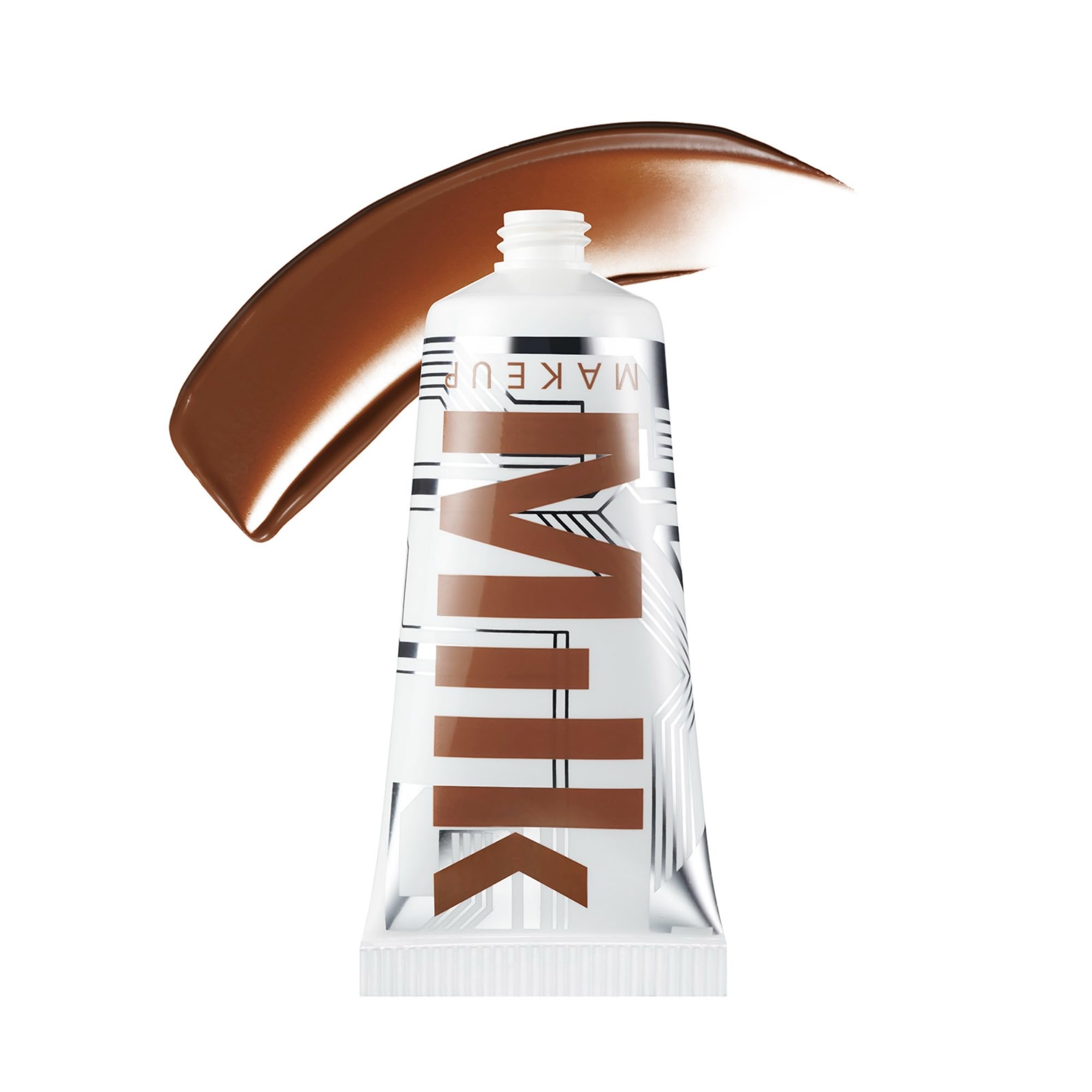 Milk Makeup Bionic Bronzer liquid sun-kissed finish adds warm glow.
