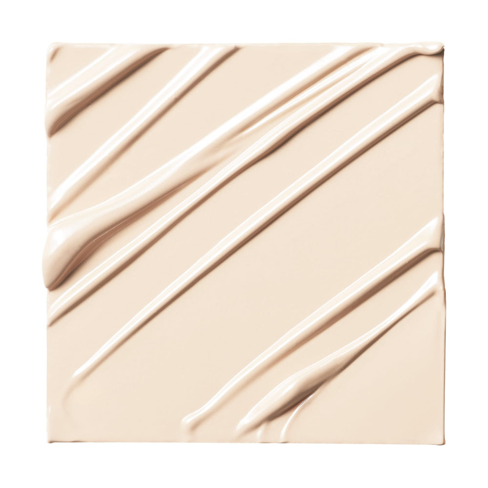 Milk Makeup Future Fluid concealer swatches show buildable coverage and natural finish.