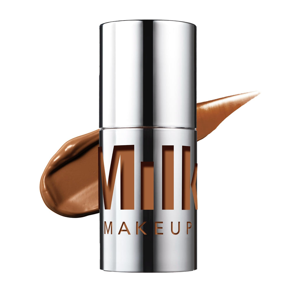 Milk Makeup Future Fluid Concealer 24N shade deep neutral for even coverage.
