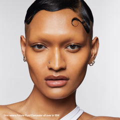 Milk Makeup Future Fluid concealer closeup shows smooth skin texture.
