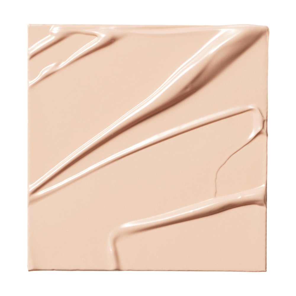 Milk Makeup Future Fluid Concealer swatch showing buildable coverage.