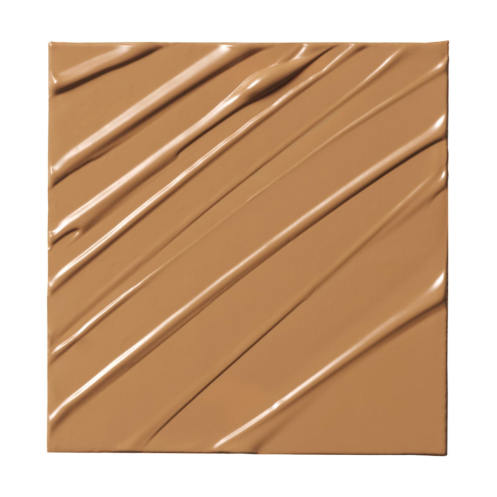 Milk Makeup Future Fluid swatches reveal warm 18W undertones and buildable coverage.