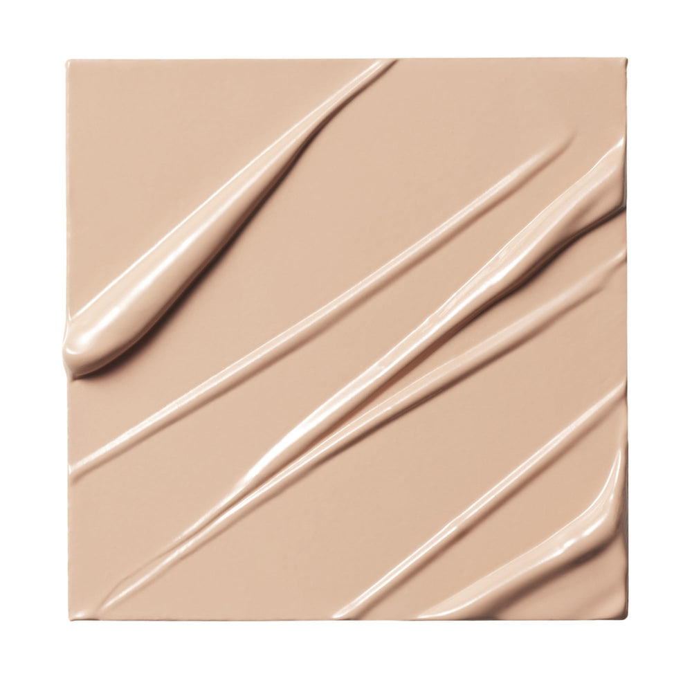 Milk Makeup Future Fluid Concealer texture swirl highlighting blendable formula