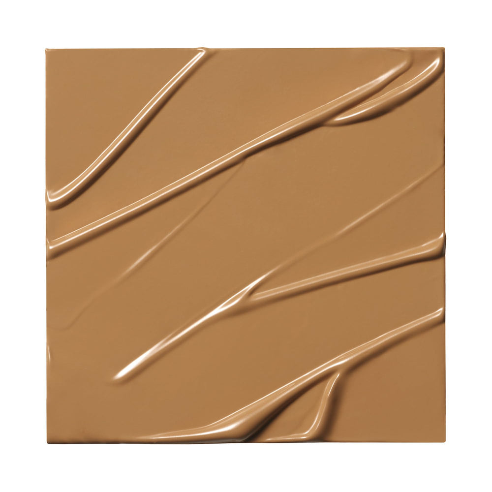 Milk Makeup Future Fluid concealer cap close-up on sleek packaging