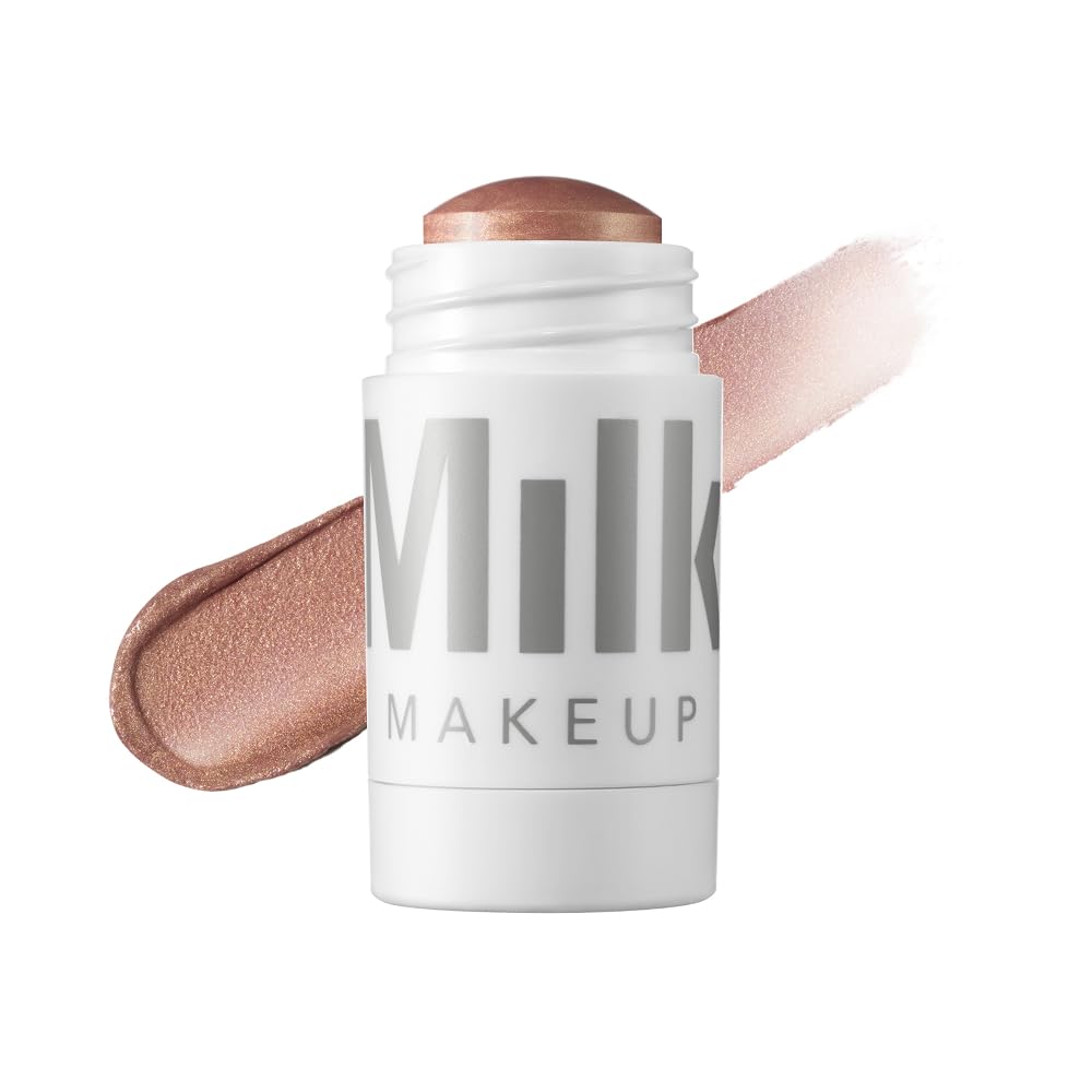 Milk Makeup Highlighter Flare rose-gold stick swatch showing buildable luminosity on the skin