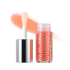 Milk Makeup KUSH lip oil in Orange Crush delivers hydrating shine with sheer tint.