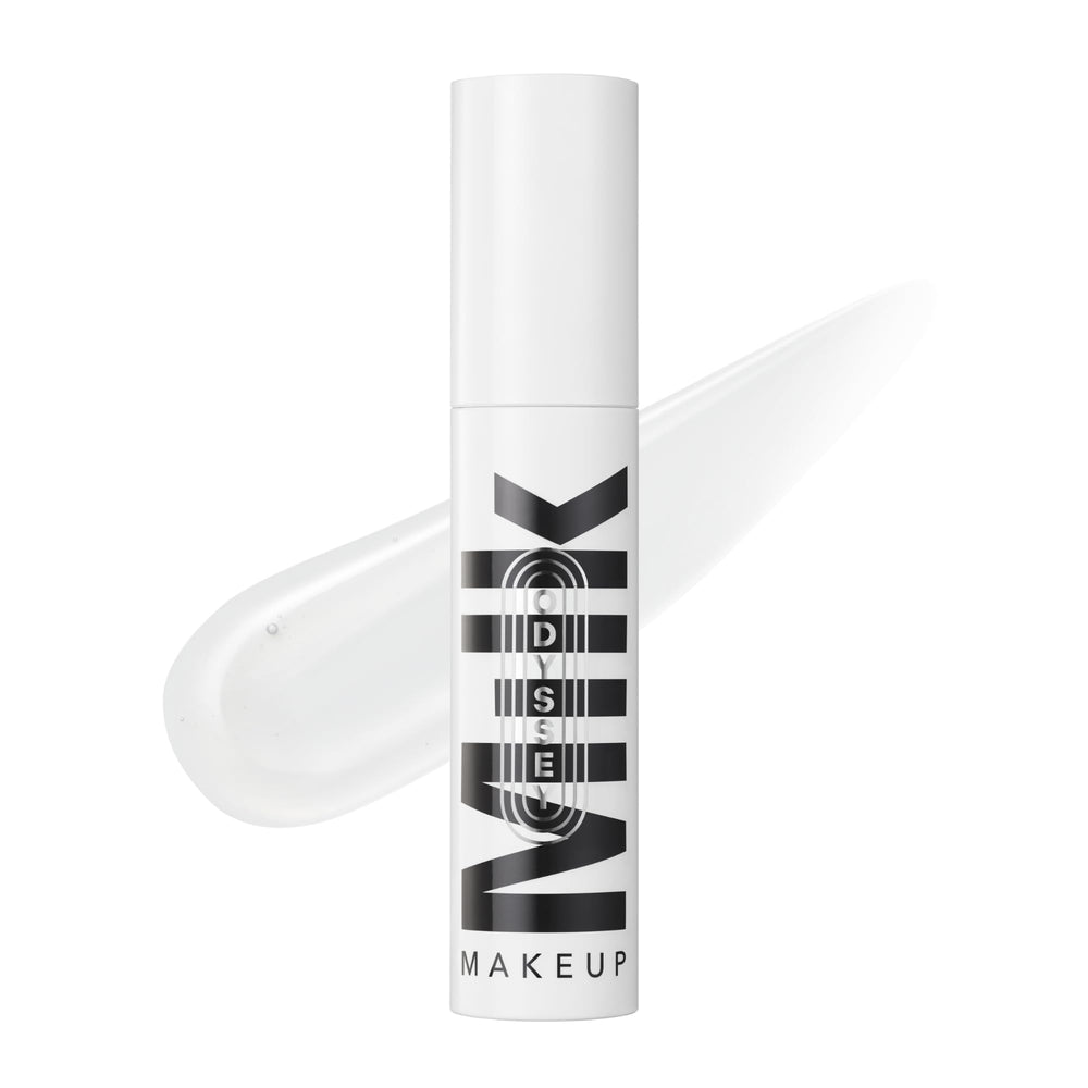 Milk Makeup Odyssey Lip Gloss jar closeup shows glossy shine and smooth texture