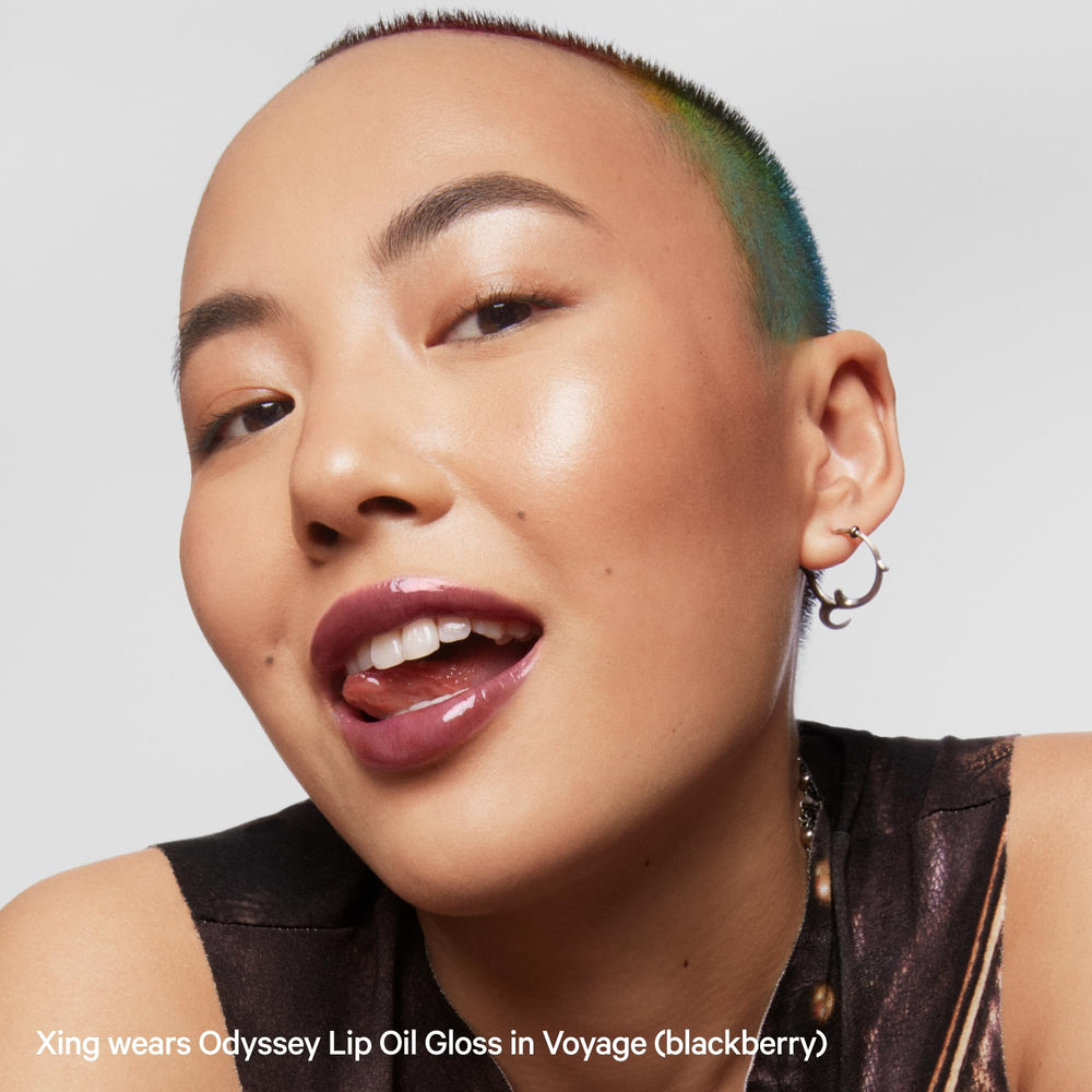 Milk Makeup Odyssey Lip Gloss vegan cruelty-free badge signals clean ingredients.