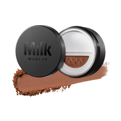Milk Makeup Pore Eclipse powder compact open shows translucent matte finish.