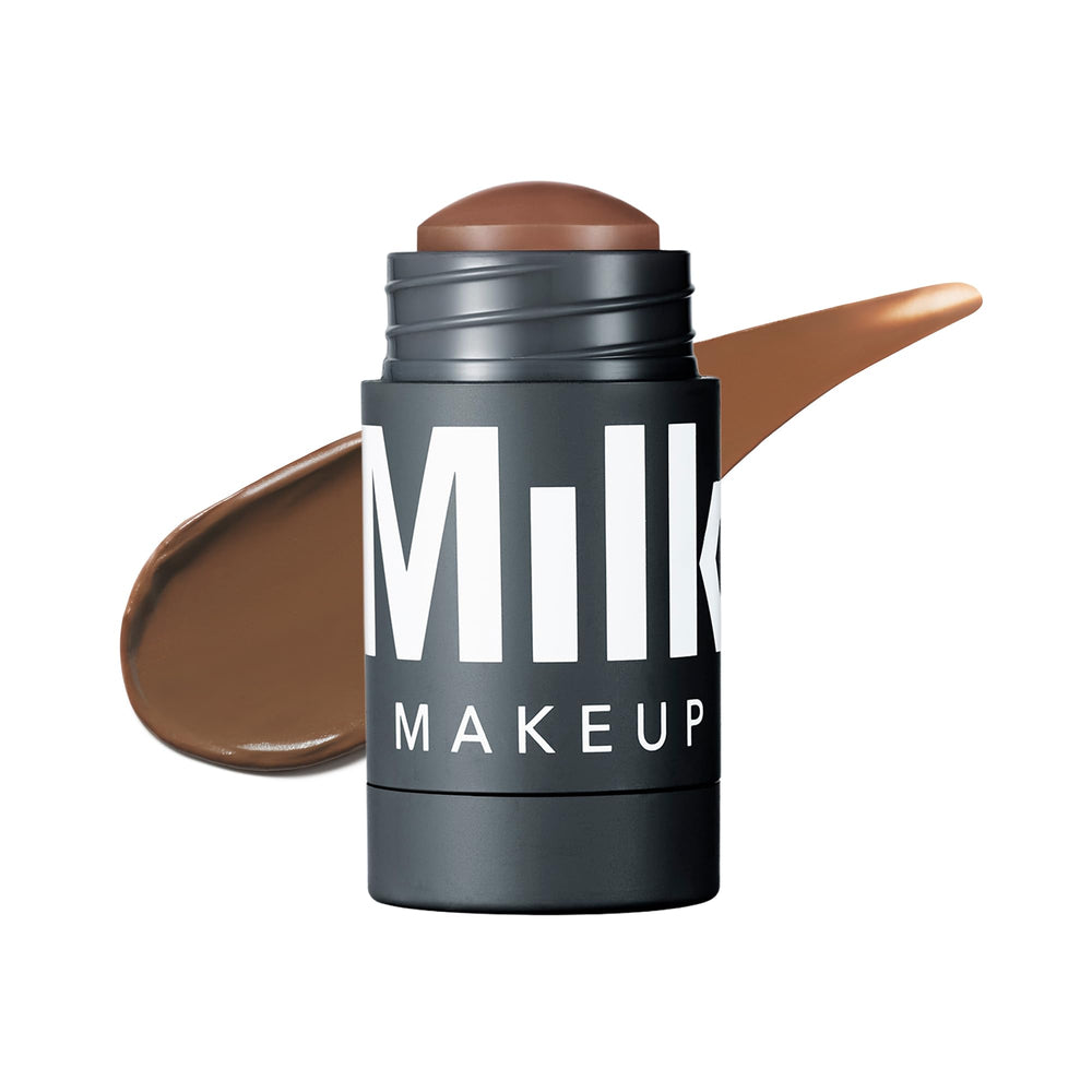 Milk Makeup Sculpt Stick applies cool-toned contour for natural cheekbone depth.