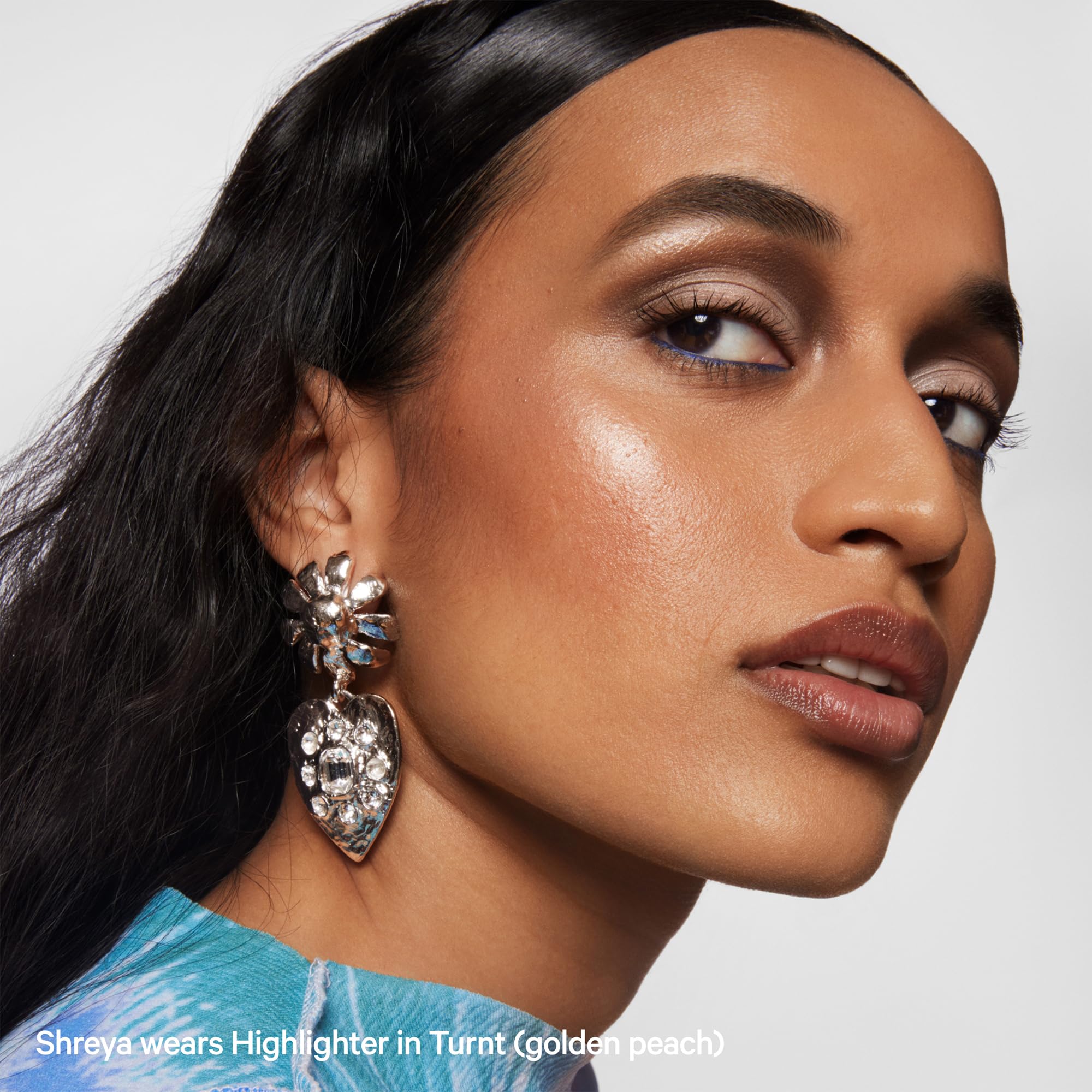 Milk Makeup Turnt highlighter vegan formula hydrates skin as it glows.