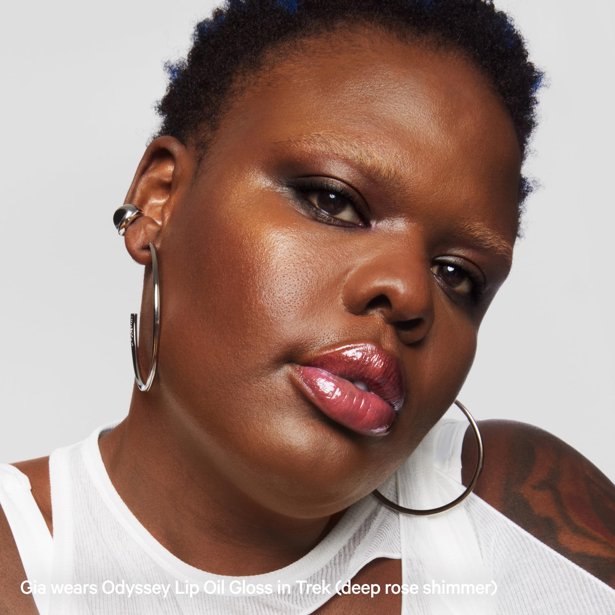 Milk Makeup Odyssey Lip Gloss Trek crushed ruby sapphires add subtle sparkle