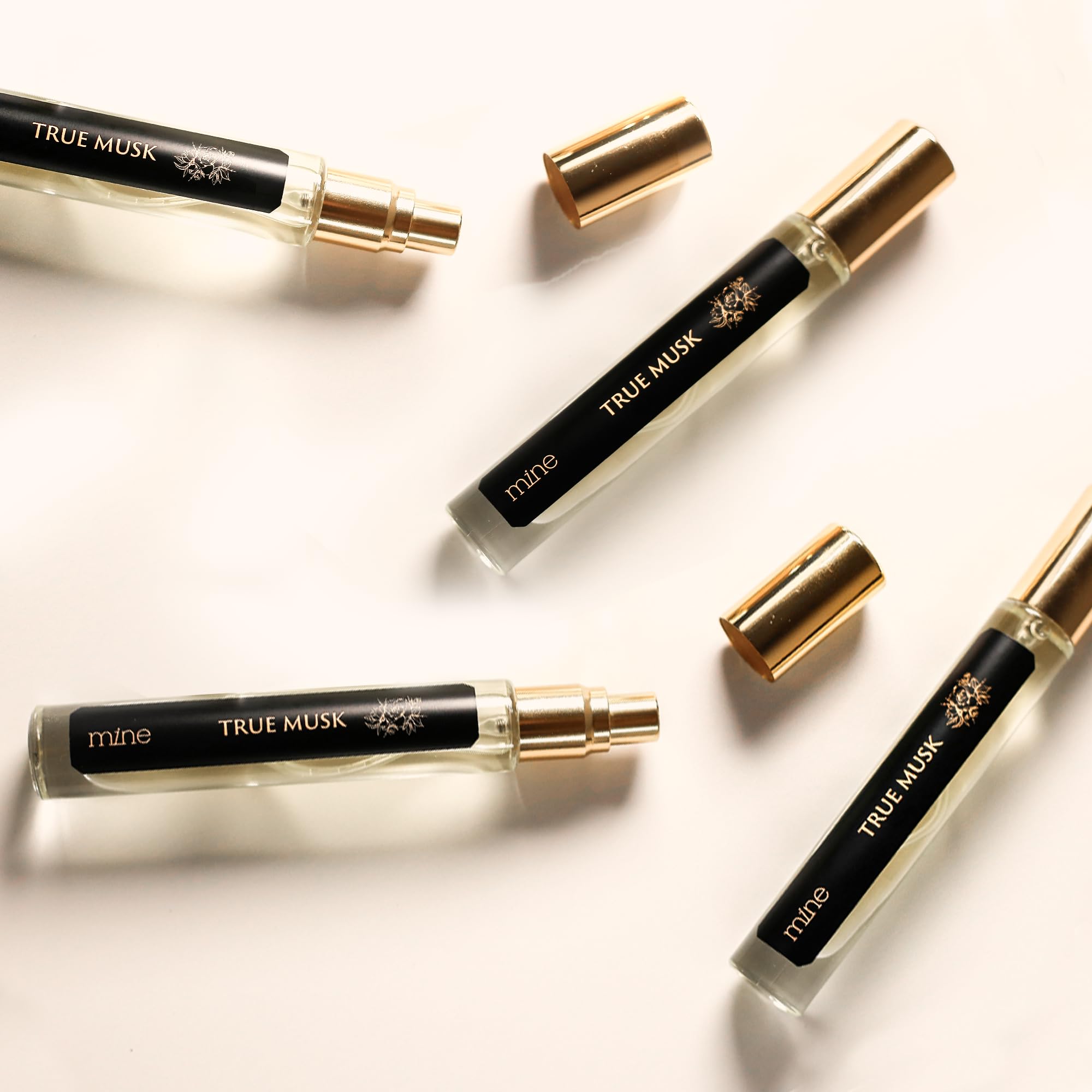 Mine Musk perfume purse-friendly packaging image fits in bags for touch-ups